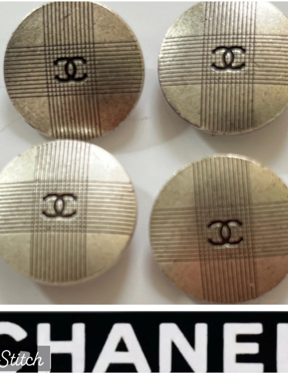 Vintage lot of four CHANEL Silver Logo Buttons stamped on back